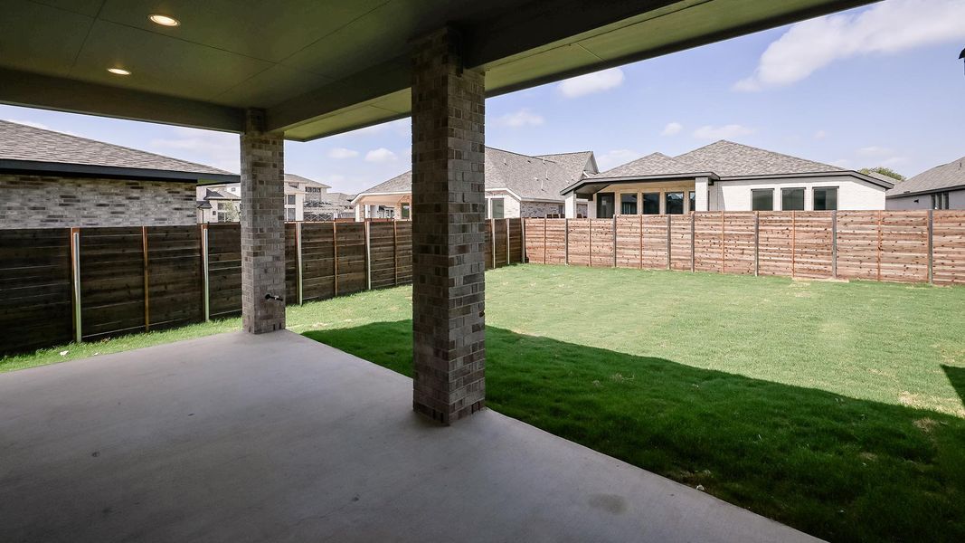 Exterior details and patio area of a home in Juniper Springs, Lockhart (Image 4).