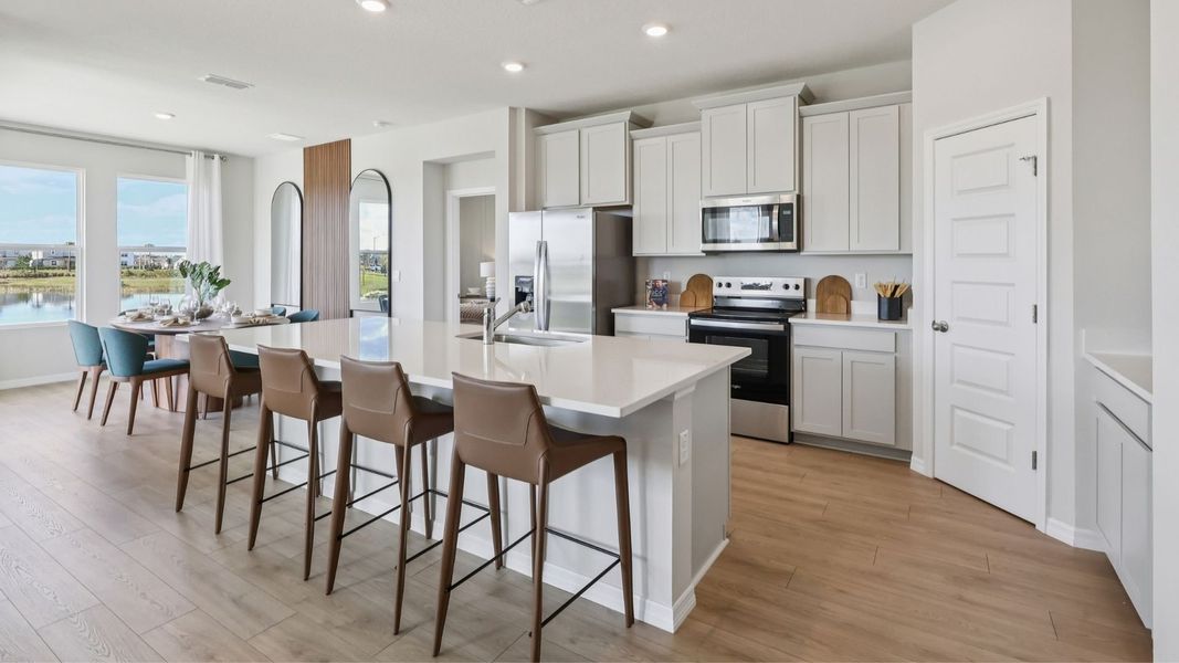 Representative furnished interior of a home built from the Robinson by D.R. Horton in Harmony West, St. Cloud (Image 6).