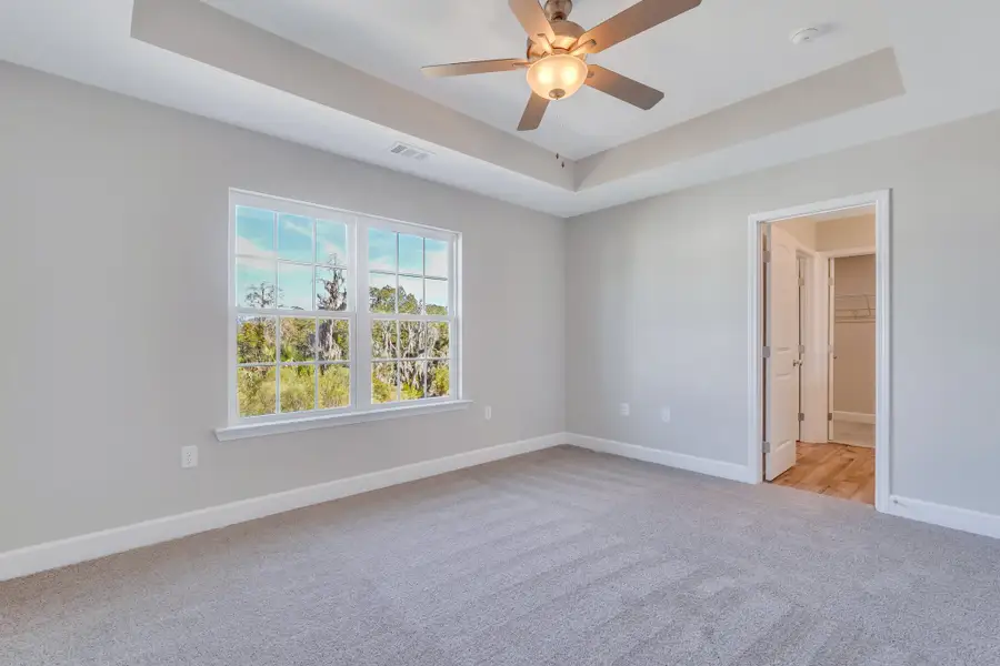 Rose Atoll - Owner’s Suite with Tray Ceiling | Ernest Homes