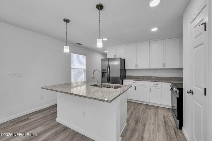 Furnished interior view inside a new home in , Jacksonville (Image 3). Furnished interior view inside a new home in , Jacksonville (Image 3).