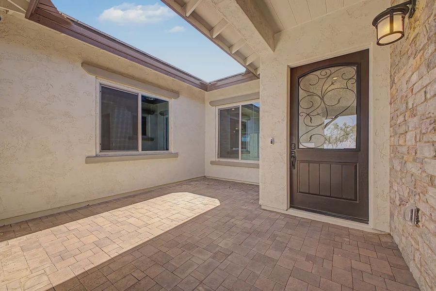 Exterior details and patio area of a home in Bellero Estates, Queen Creek (Image 3). Exterior details and patio area of a home in Bellero Estates, Queen Creek (Image 3).