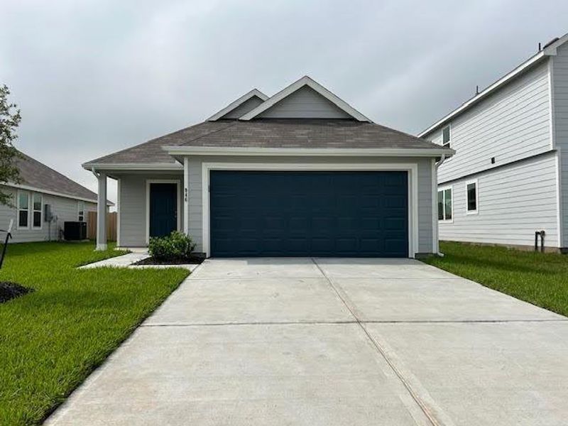 Front exterior of a new home in Charleston Heights, Rosharon, TX, highlighting curb appeal (Image 1).