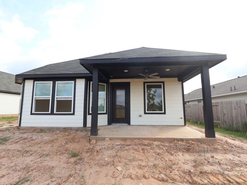 Front exterior of a new home in Magnolia Ridge, Magnolia, TX, highlighting curb appeal (Image 19). Front exterior of a new home in Magnolia Ridge, Magnolia, TX, highlighting curb appeal (Image 19).