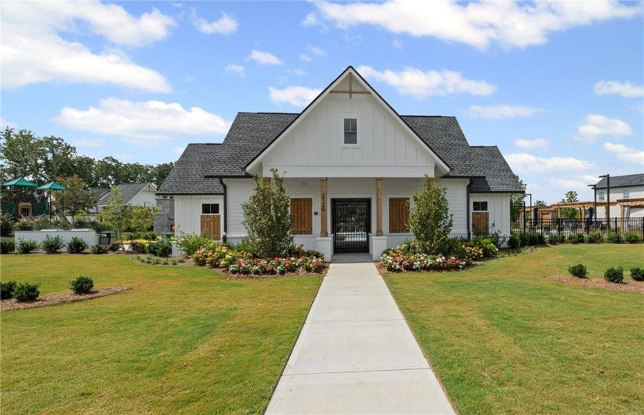 Front exterior of a new home in Sterling Pointe, Cumming, GA, highlighting curb appeal (Image 1).