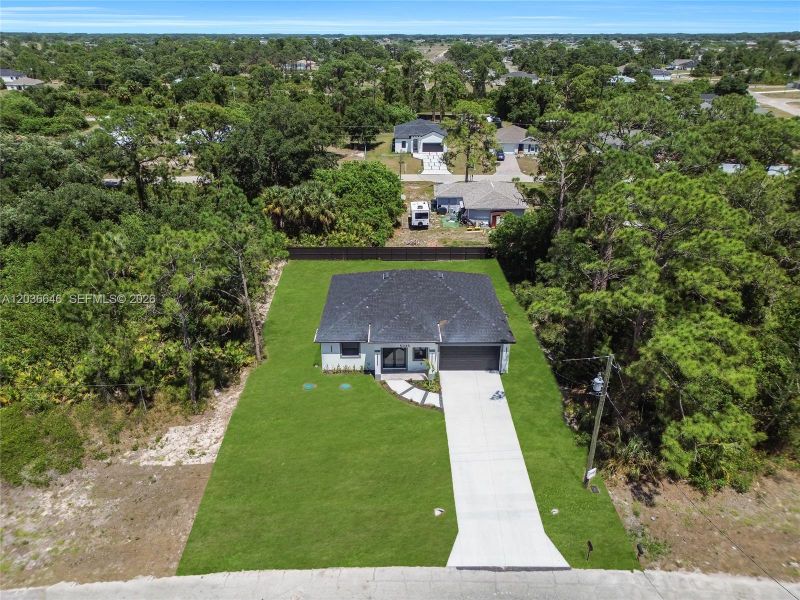 Front exterior of a new home in , Labelle, FL, highlighting curb appeal (Image 1). Front exterior of a new home in , Labelle, FL, highlighting curb appeal (Image 1).