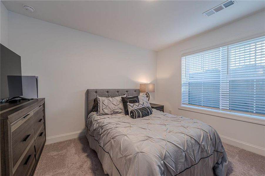 Furnished interior view inside a new home in , Suwanee (Image 34).