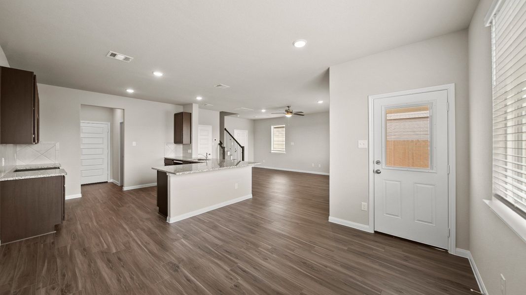 Dining Area to Kitchen and Family Room