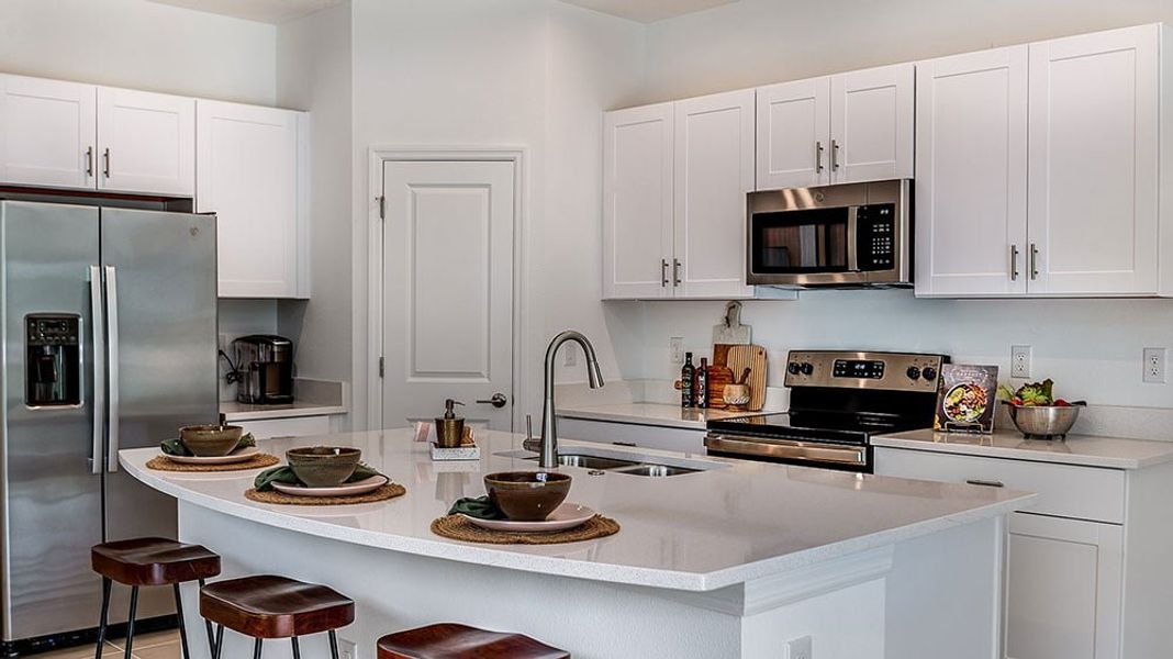 Representative furnished interior of a home built from the Marigold by Taylor Morrison in The Townhomes at Skye Ranch, Sarasota (Image 3).
