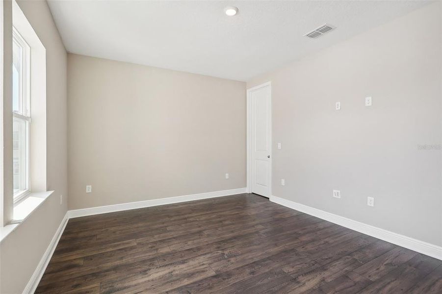 Spacious, unfurnished interior of a new home in Laureate Park, Orlando (Image 42).