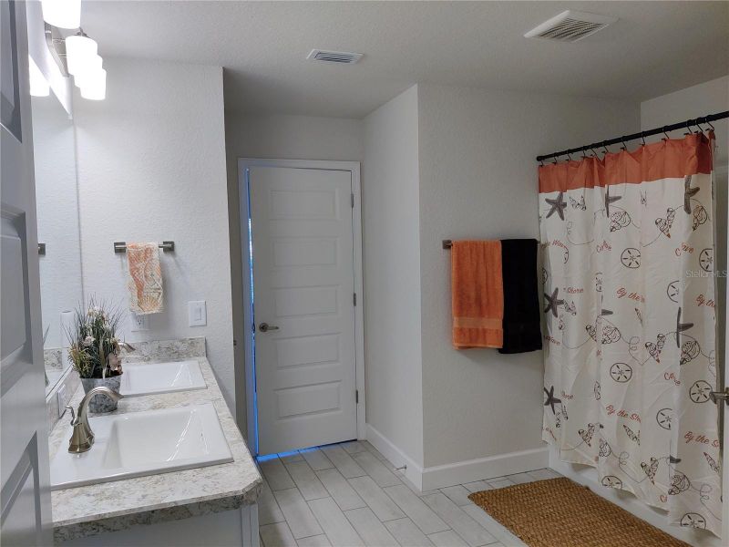 Furnished interior view inside a new home in Sunset Landing, Spring Hill (Image 11).