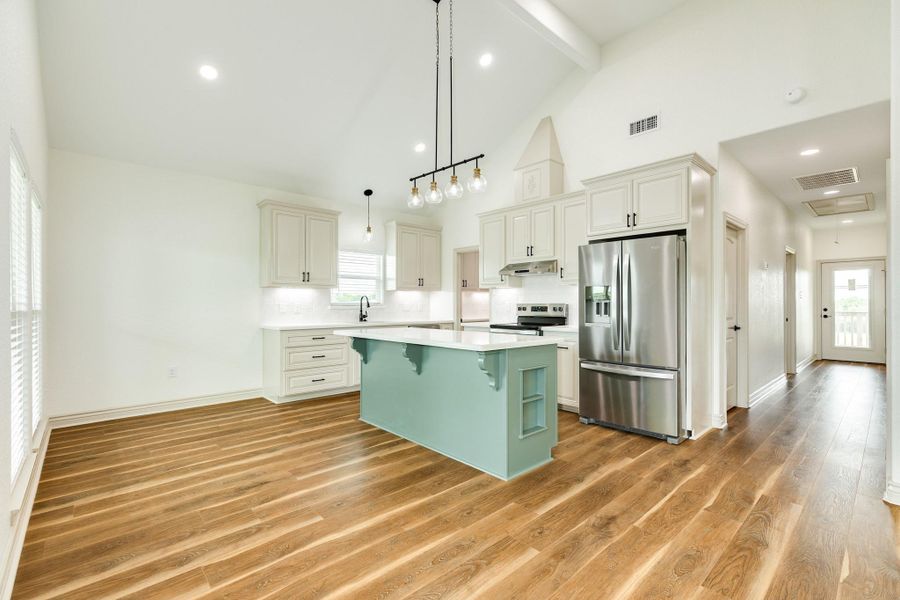 Furnished interior view inside a new home in , Oyster Creek (Image 3).