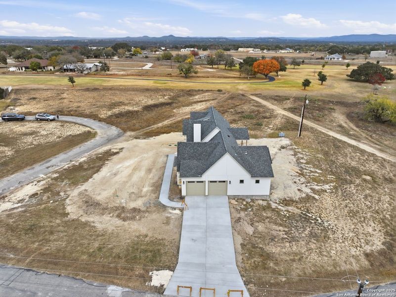Site preparation for new homesites in , Bandera (Image 44).