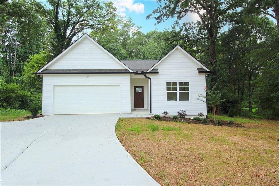 Front exterior of a new home in , Austell, GA, highlighting curb appeal (Image 26).