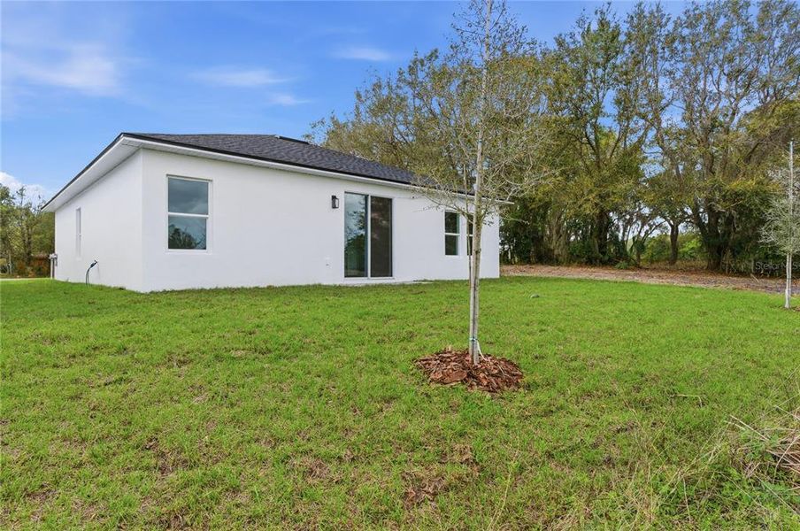 Exterior details and patio area of a home in , Osteen (Image 4).