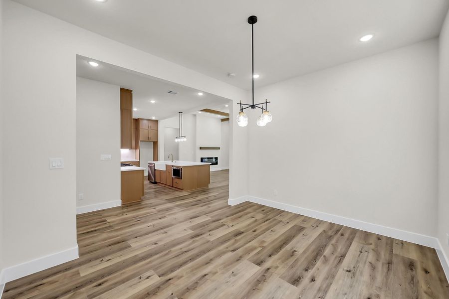 The dining room with easy access to the kitchen.