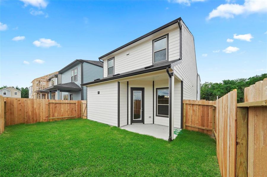 Back yard with covered patio