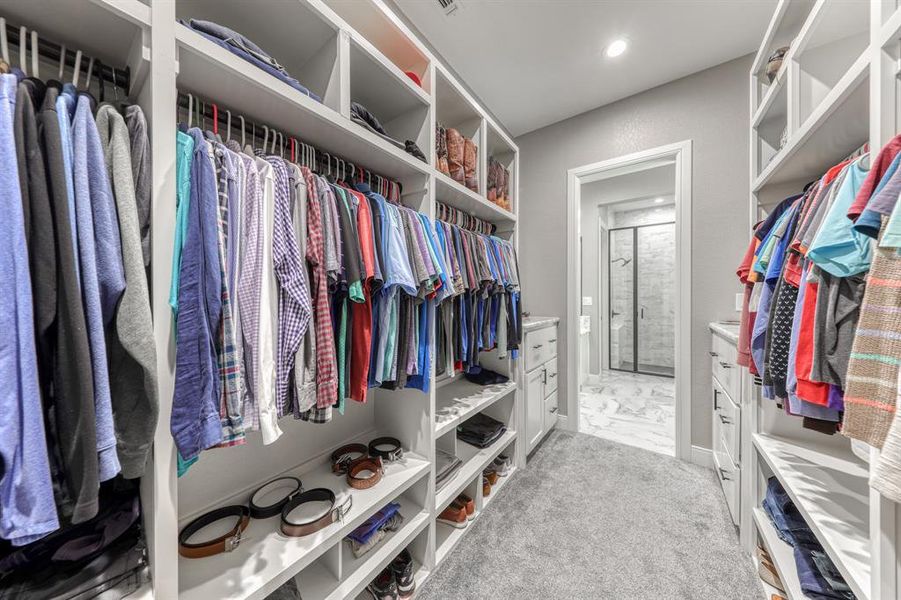 A generously sized closet designed for two people.