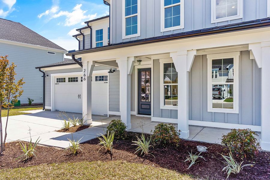 Representative exterior details of a home built from the The Hampton by RobuckHomes in Windwater, Hampstead (Image 3).