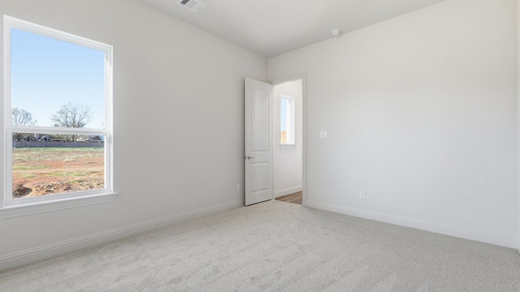 Furnished interior view inside a new home in Lakeshore Bluffs, Shady Shores (Image 15).