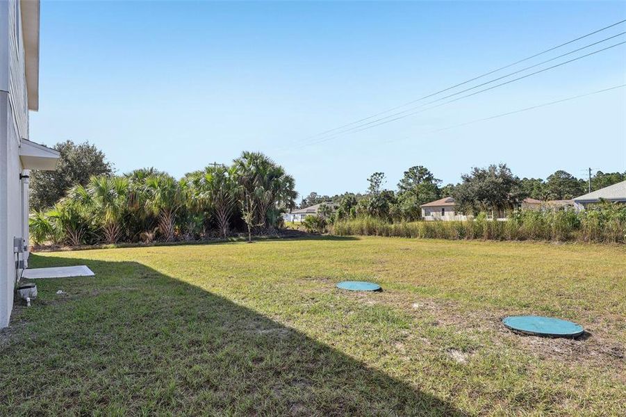 Exterior details and patio area of a home in Palm Bay Classic, Palm Bay (Image 3).