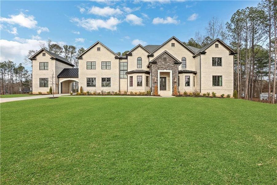 Front exterior of a new home in , Milton, GA, highlighting curb appeal (Image 32). Front exterior of a new home in , Milton, GA, highlighting curb appeal (Image 32).