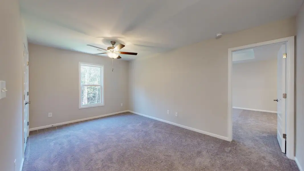 Representative unfurnished interior of a home built from the Westin A by JC Jackson Homes,LLC in Heritage Pointe, Newport (Image 14).