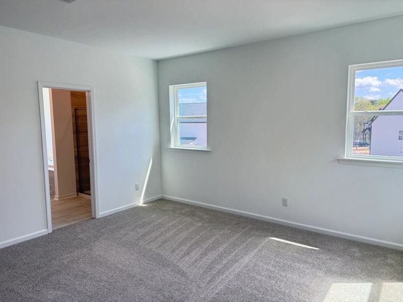 Spacious, unfurnished interior of a new home in Rowland's Grant, Fuquay Varina (Image 25).