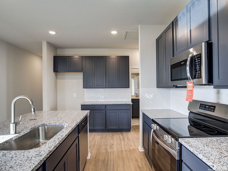 Furnished interior view inside a new home in Applewhite Meadows, San Antonio (Image 5). Furnished interior view inside a new home in Applewhite Meadows, San Antonio (Image 5).
