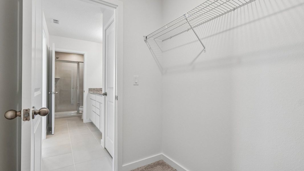 Furnished interior view inside a new home in Cyrene at Harmony, St. Cloud (Image 33).