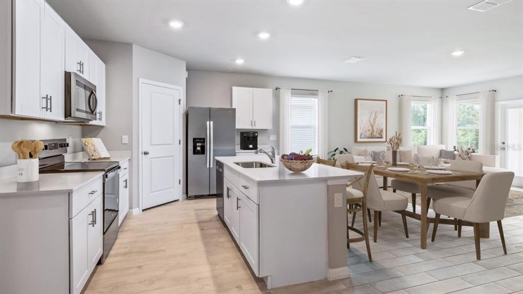 Furnished interior view inside a new home in Coral Lakes - Tradition & Express, Punta Gorda (Image 14).