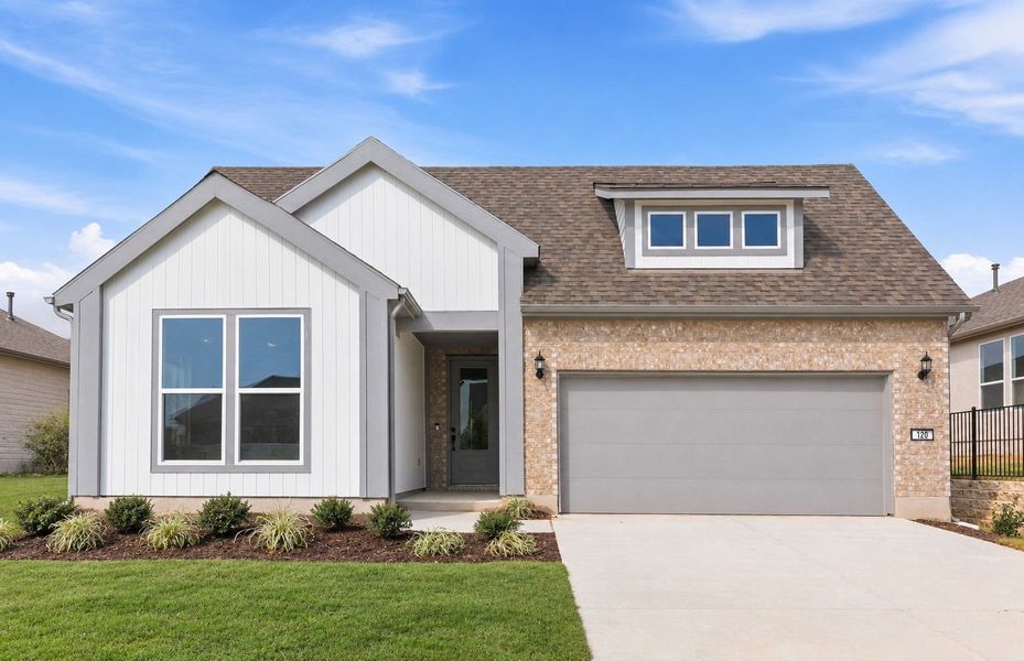 Front exterior of a new home in Sun City Texas, Georgetown, TX, highlighting curb appeal (Image 24). Front exterior of a new home in Sun City Texas, Georgetown, TX, highlighting curb appeal (Image 24).
