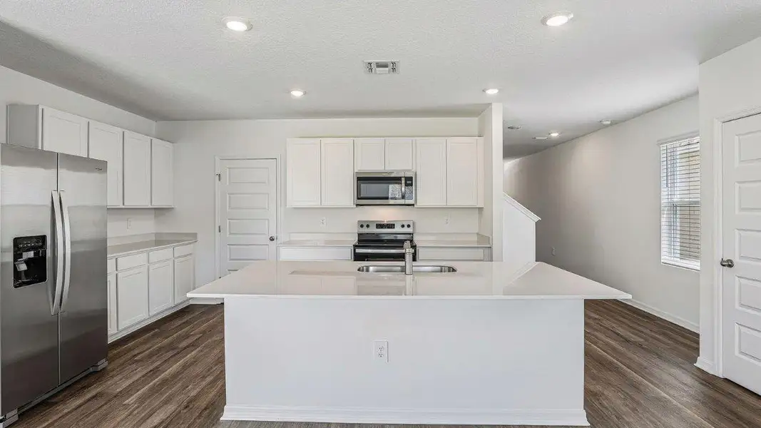 Furnished interior view inside a new home in Avalon Park Tavares, Tavares (Image 4).