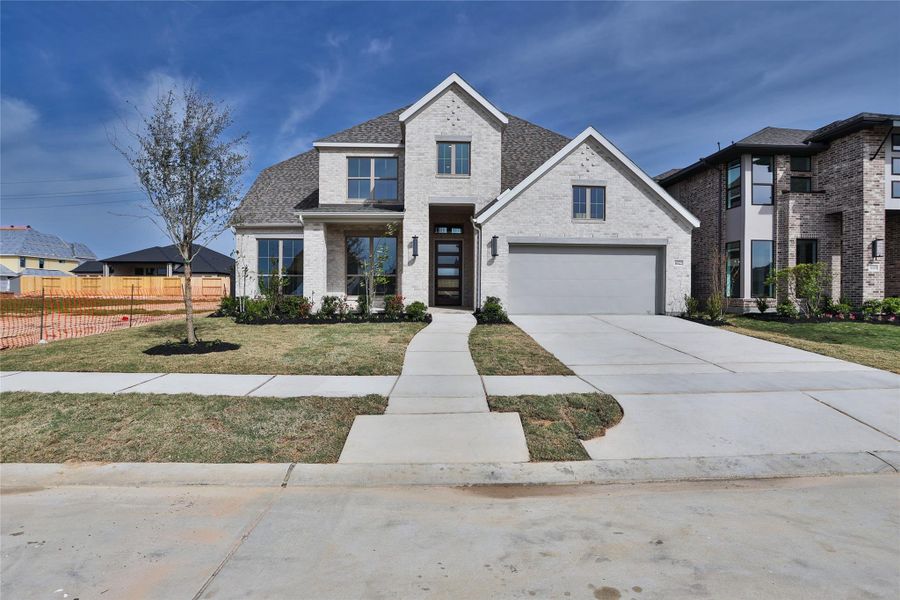 Front exterior of a new home in Jubilee, Hockley, TX, highlighting curb appeal (Image 2).