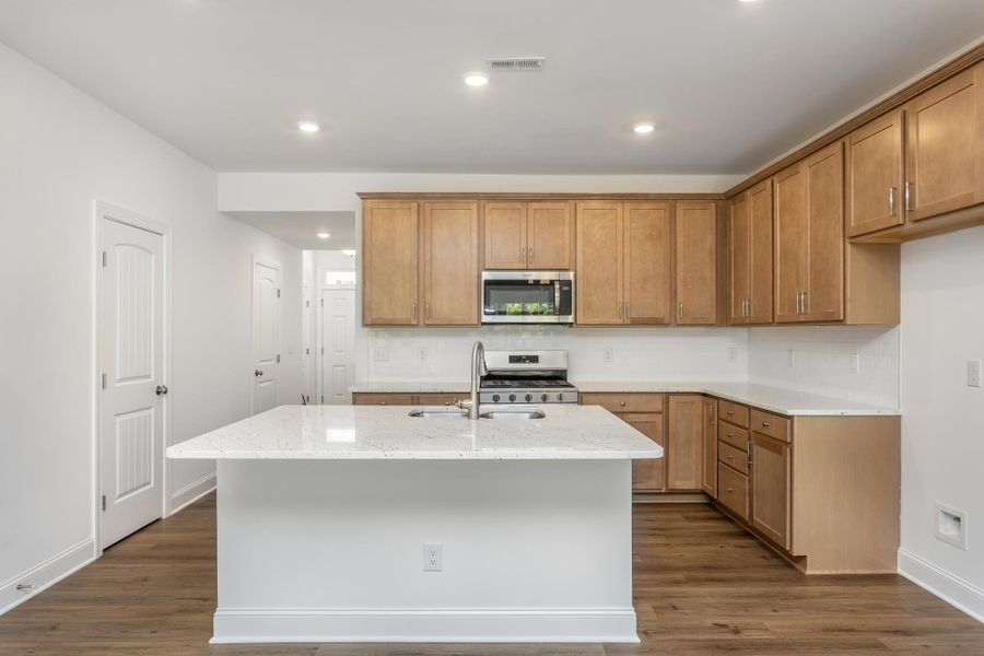 Furnished interior view inside a new home in Running Brook Townes, Durham (Image 6).
