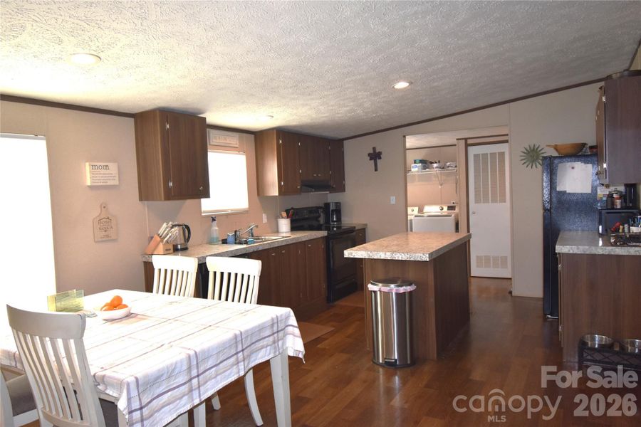 Furnished interior view inside a new home in , Lenoir (Image 16).