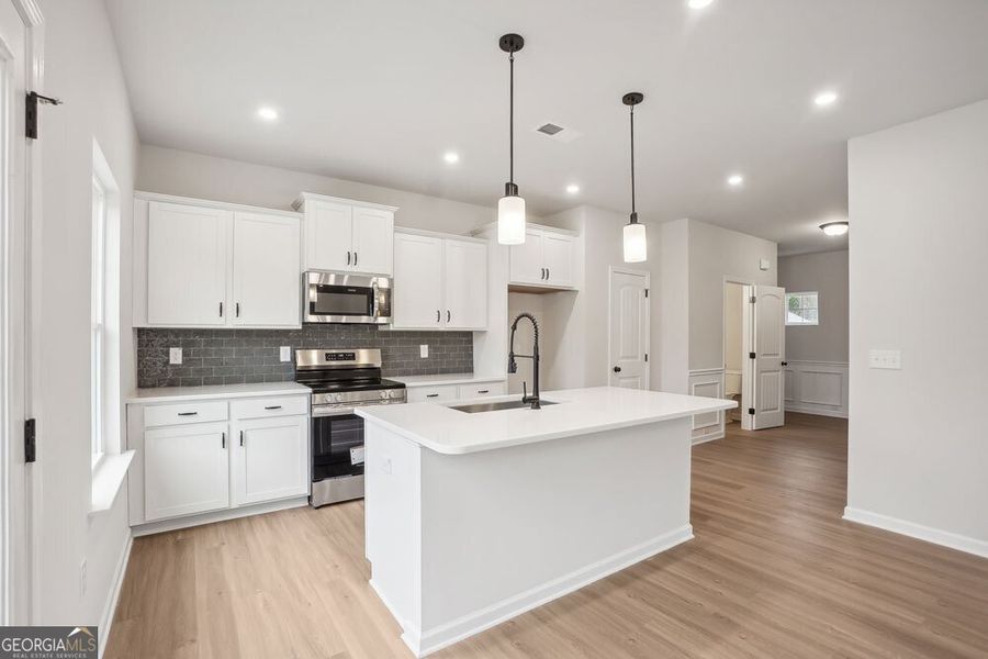 Furnished interior view inside a new home in Stonebridge North, Macon (Image 4).