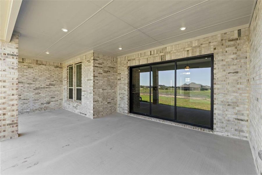 Exterior details and patio area of a home in Heritage, McLendon-Chisholm (Image 3).