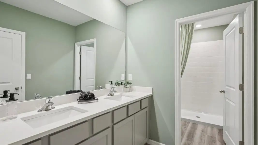 Furnished interior view inside a new home in Towns at Woodsdale, Wesley Chapel (Image 19).
