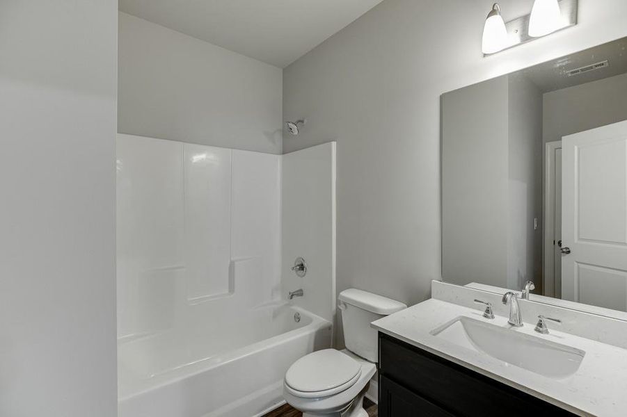 Furnished interior view inside a new home in , Suwanee (Image 8).