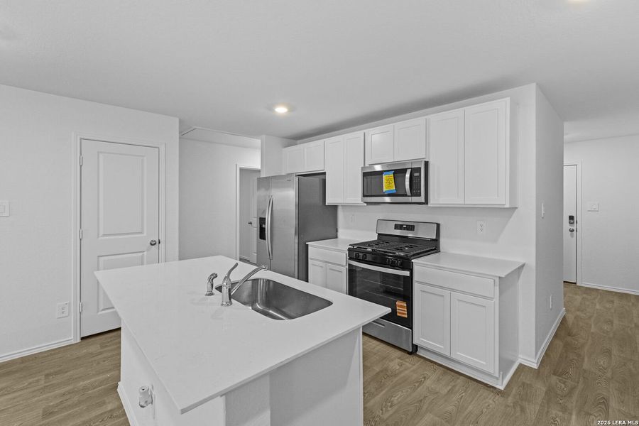 Furnished interior view inside a new home in Hickory Ridge, Elmendorf (Image 5).