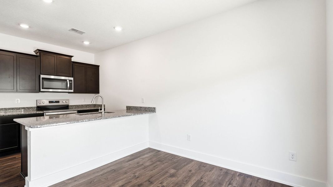 Furnished interior view inside a new home in Cherokee Crossing, Kodak (Image 6).