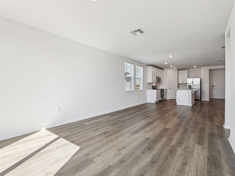 Spacious, unfurnished interior of a new home in Lake Deer Estates - Signature Series, Poinciana (Image 9).