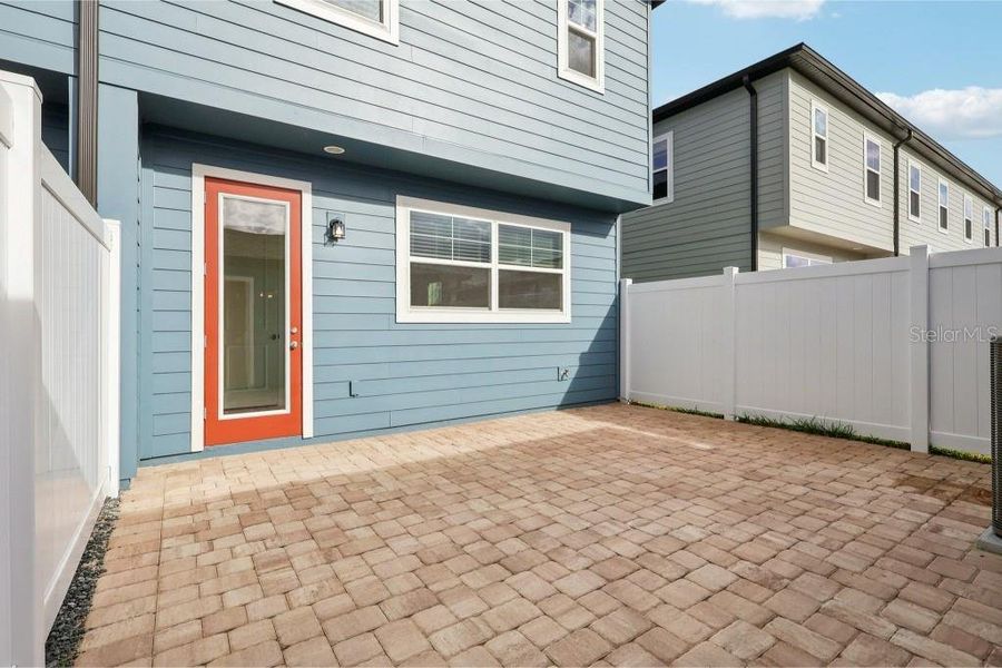 Exterior details and patio area of a home in Northlake Townhomes, Winter Garden (Image 3). Exterior details and patio area of a home in Northlake Townhomes, Winter Garden (Image 3).