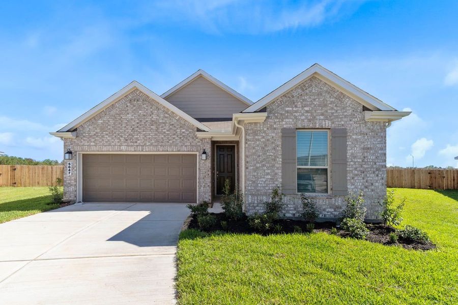 Front exterior of a new home in Sunset Grove South, Hitchcock, TX, highlighting curb appeal (Image 1). Front exterior of a new home in Sunset Grove South, Hitchcock, TX, highlighting curb appeal (Image 1).