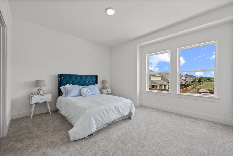 Representative furnished interior of a home built from the Plan 2 by Monarch Homes in Royal Court, Frisco (Image 30).