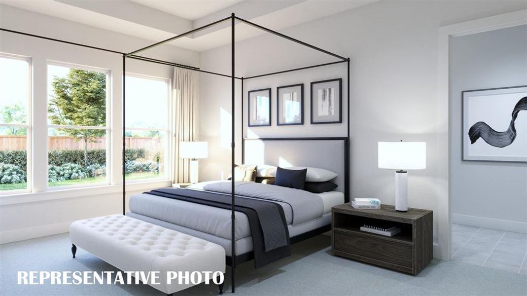 This dreamy owners suite combines high ceilings and oversized windows to create a relaxing and peaceful retreat.  REPRESENTATIVE PHOTO