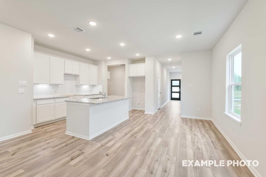 Furnished interior view inside a new home in Caney Creek Place, Conroe (Image 6).