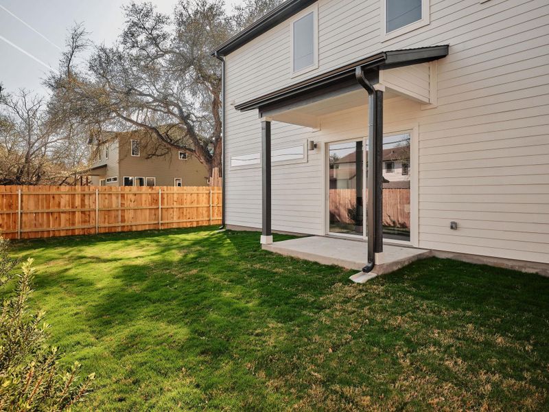 Fenced yard with a patio