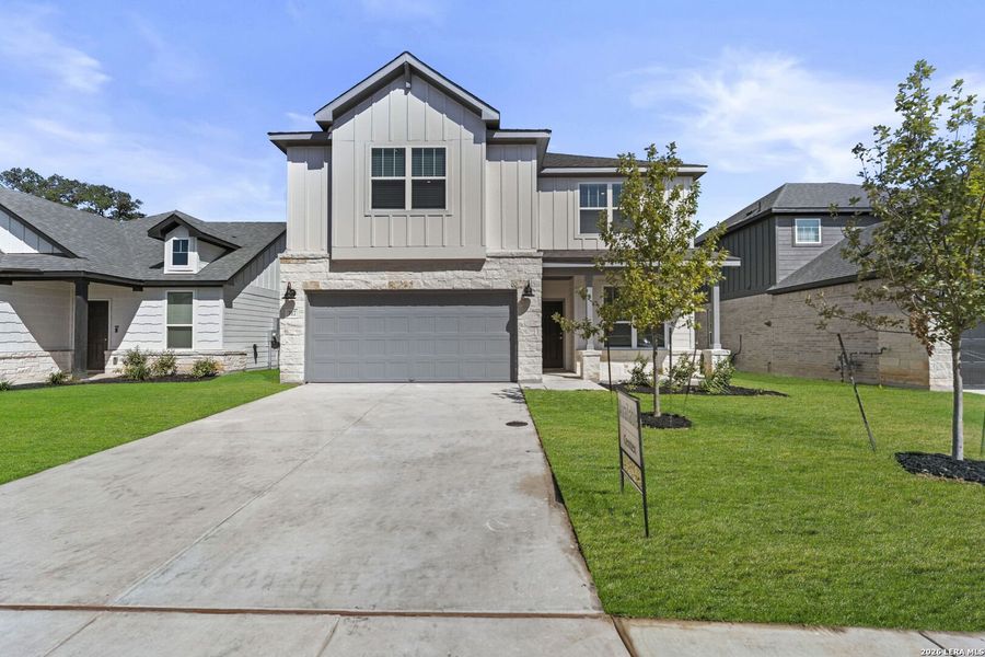 Front exterior of a new home in Corley Farms, Boerne, TX, highlighting curb appeal (Image 1). Front exterior of a new home in Corley Farms, Boerne, TX, highlighting curb appeal (Image 1).
