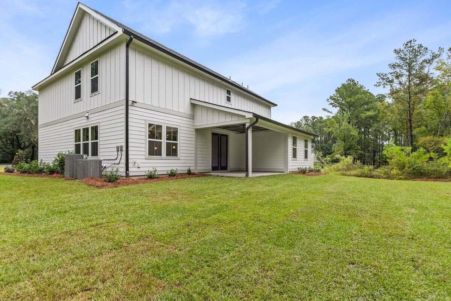 Exterior details and patio area of a home in , Ravenel (Image 3).